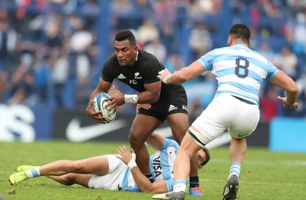 New Zealand's All Blacks Sevu Reece, left, is tackled by Argentina's Los Pumas Ramiro Moyano, during a rugby championship match against Argentina's Los Pumas in Buenos Aires, Argentina, Saturday, July 20, 2019. (AP Photo/Natacha Pisarenko)