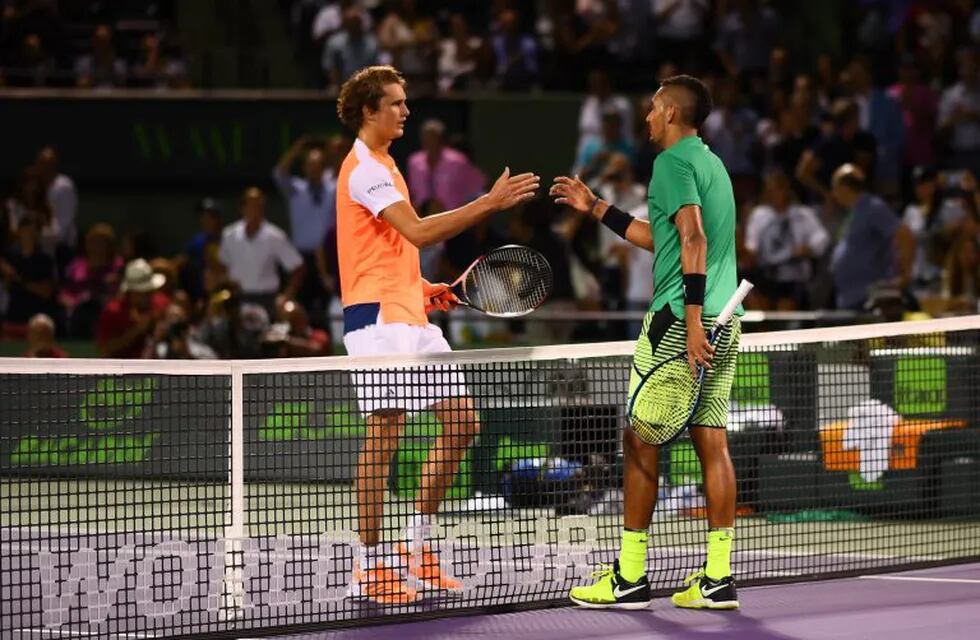 KEY BISCAYNE, FL - MARCH 30: Alexander Zverev of Germany and Nick Kyrgios of Australia shake hands after a match on day 11 of the Miami Open at the Crandon Park Tennis Center on March 30, 2017 in Key Biscayne, Florida.   Rob Foldy/Getty Images/AFPn== FOR 