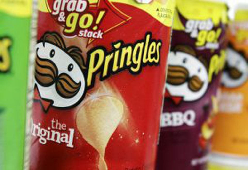 Pringles chips are seen in a posed photo at a West Bath grocery store on Tuesday, April 5, 2011. Diamond Foods Inc. is buying Procter & Gamble Co.'s Pringles chips business in a $1.5 billion deal, the biggest in a string that have given the maker of Pop S