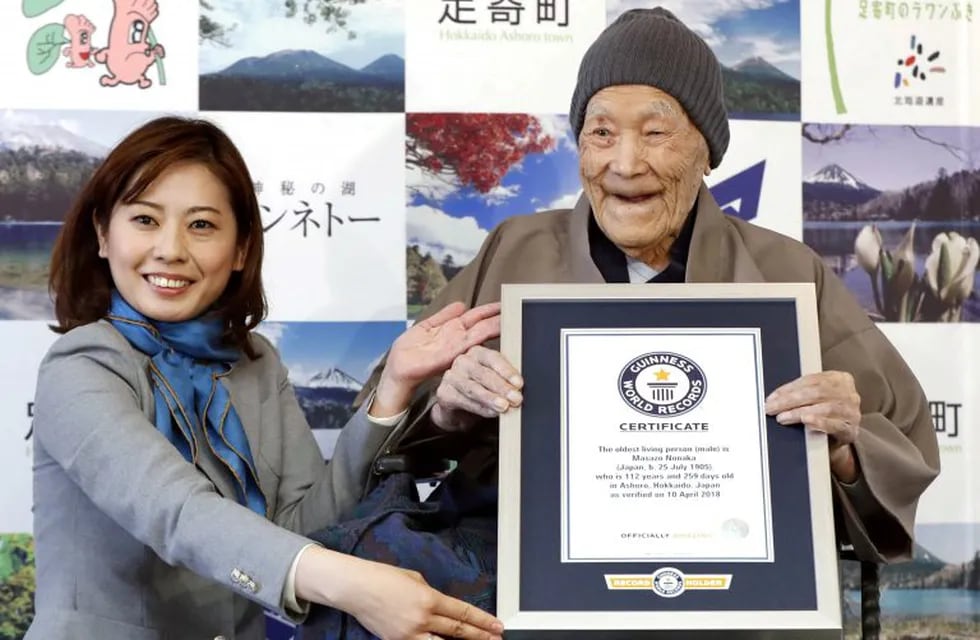 FILE PHOTO: Japanese Masazo Nonaka, who was born 112 years and 259 days ago, receives a Guinness World Records certificate naming him the world's oldest man during a ceremony in Ashoro, on Japan's northern island of Hokkaido, in this photo taken by Kyodo April 10, 2018. Nonaka died at the age of 113 on January 20, 2019, local media reported. Mandatory credit Kyodo/via REUTERS/File Photo ATTENTION EDITORS - THIS IMAGE WAS PROVIDED BY A THIRD PARTY. MANDATORY CREDIT. JAPAN OUT. NO COMMERCIAL OR EDITORIAL SALES IN JAPAN.
