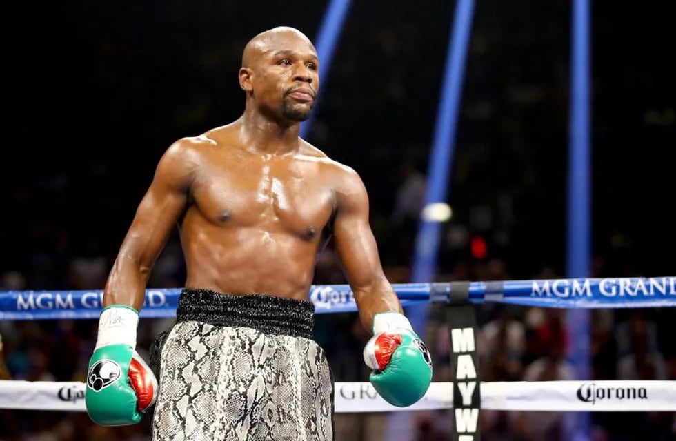 (FILES) In this file photo taken on September 13, 2014, Floyd Mayweather Jr. looks on while taking on Marcos Maidana during their WBC/WBA welterweight title fight at the MGM Grand Garden Arena in Las Vegas, Nevada. - Mayweather has teased a possible return to fighting, writing in an Instagram post he was \