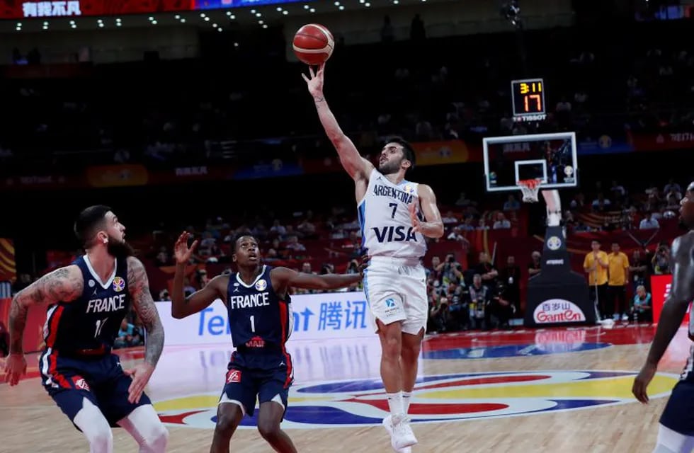 Facundo Campazzo of Argentina goes for a three pointer shoot against France during their semifinals match for the FIBA Basketball World Cup at the Cadillac Arena in Beijing, Saturday, Sept. 13, 2019. (AP Photo/Andy Wong)