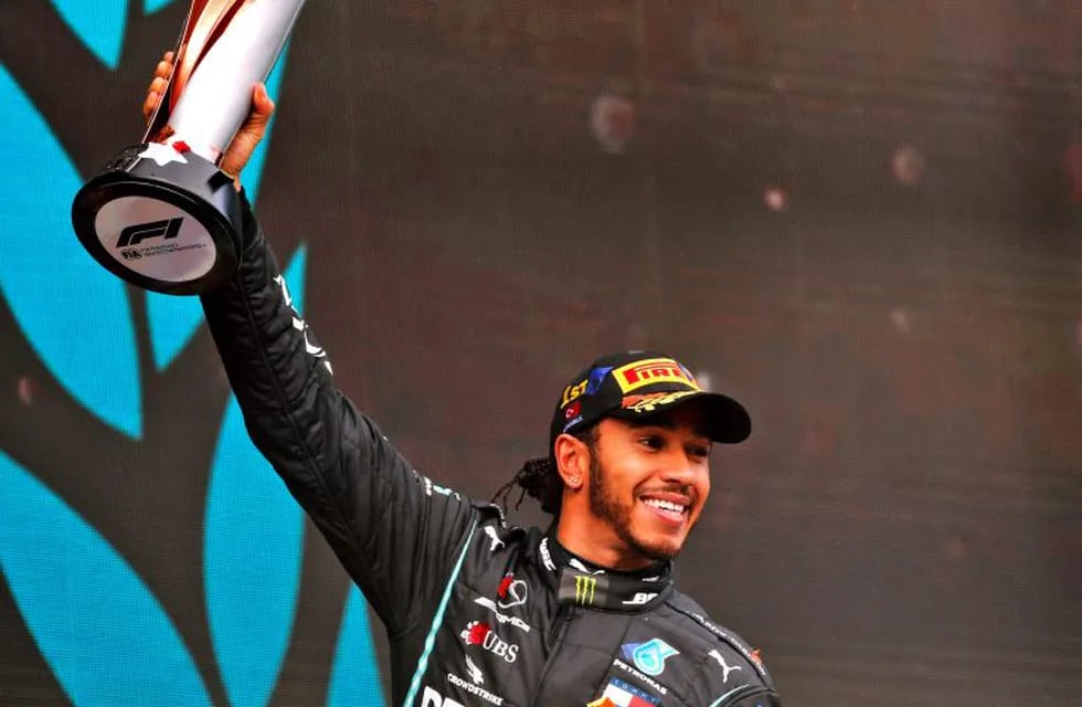 15 November 2020, Turkey, Istanbul: British Formula One driver of Mercedes AMG Petronas team, Lewis Hamilton, celebrates on the podium after winning the Turkish Grand Prix and securing his seventh world championship at Istanbul Park circuit. Photo: -/PA Wire/dpa