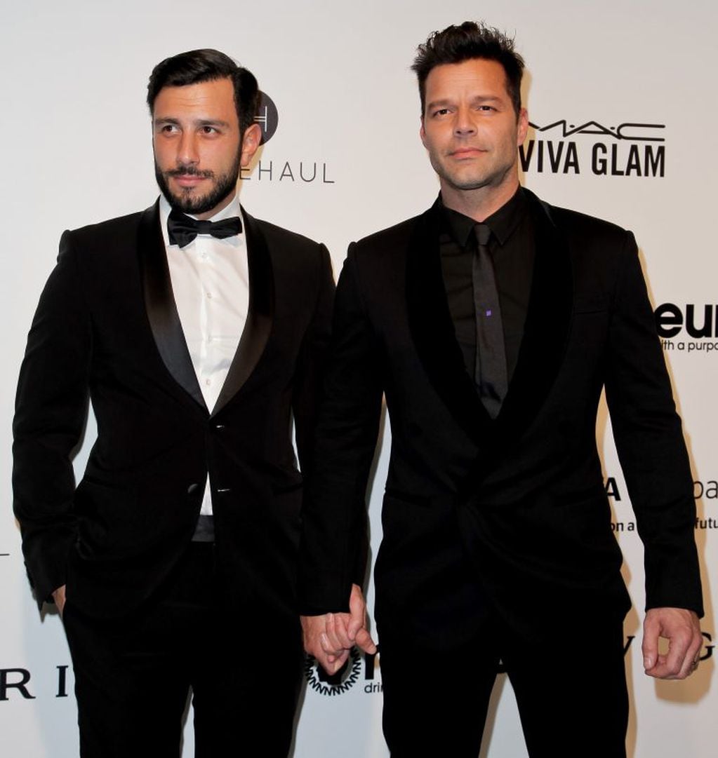 (FILES) This file photo taken on February 26, 2017 shows Syrian-Swedish artist Jwan Yosef and Puerto Rico's Ricky Martin upon their arrival for the 25th annual Elton John AIDS Foundation's Academy Awards Viewing Party in West Hollywood, California.

Singer Ricky Martin of "Livin' la Vida Loca" fame announced January 10, 2018 he has married his partner of two years, Jwan Yosef."I'm a husband," the Puerto Rican singer told E! television without specifying the date of the wedding. "We're doing a heavy party in a couple of months." The 46-year-old singer began going out in 2016 with Yosef, 33, a Syrian-born Swedish artist. / AFP PHOTO / TIBRINA HOBSON