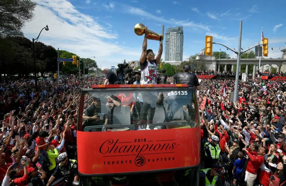 Toronto Raptors basketball player Kyle Lowry celebrates with fans during the Raptors victory parade after defeating the Golden State Warriors in the 2019 NBA Finals, in Toronto, Ontario, Canada June 17, 2019.    REUTERS/Moe Doiron