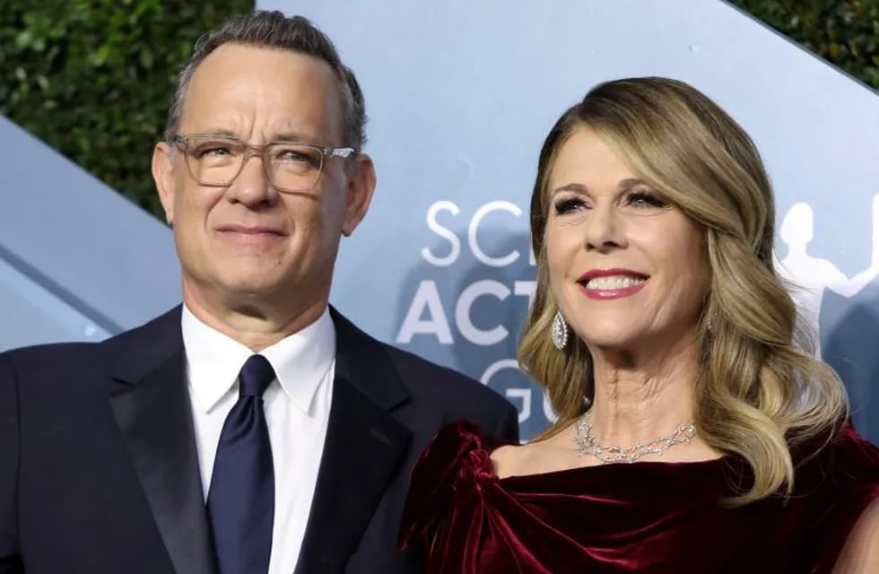 FILE PHOTO: 26th Screen Actors Guild Awards - Arrivals - Los Angeles, California, U.S., January 19, 2020 - Tom Hanks and Rita Wilson. REUTERS/Monica Almeida/File Photo