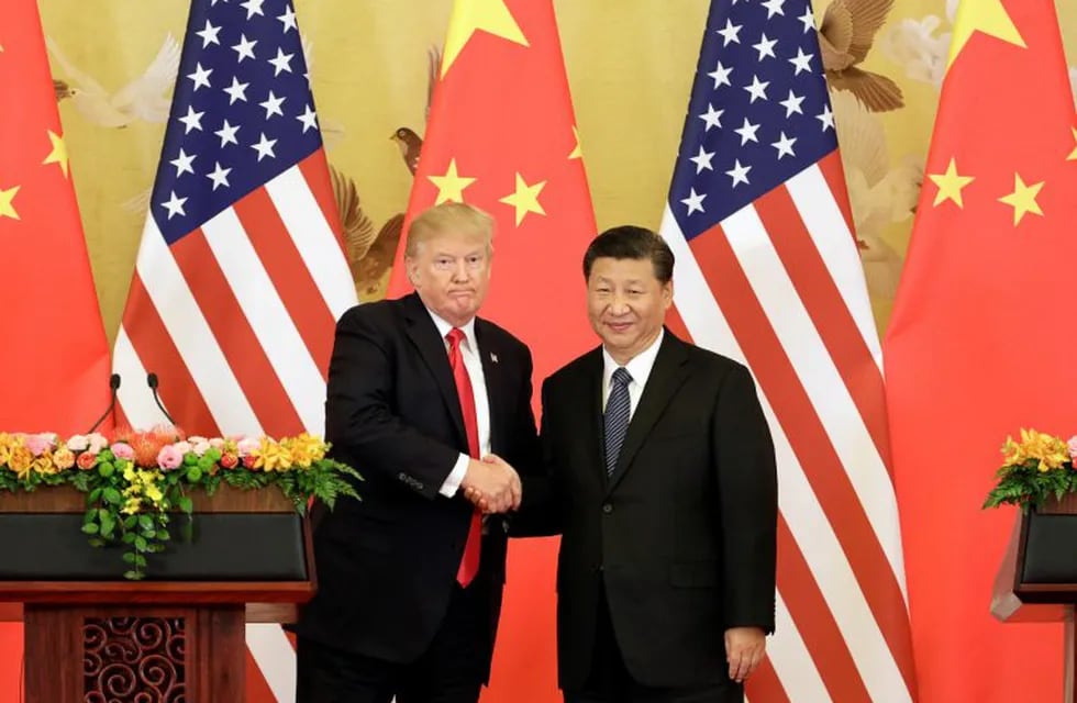 FILE: U.S. President Donald Trump, left, and Xi Jinping, China's president, shake hands during a news conference at the Great Hall of the People in Beijing, China, on Thursday, Nov. 9, 2017. Monday, January 20, 2020, marks the third anniversary of U.S. President Donald Trump's inauguration. Our editors select the best archive images looking back over Trump’s term in office. Photographer: Qilai Shen/Bloomberg