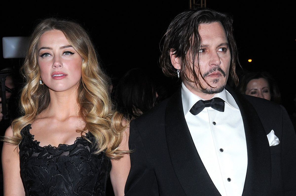 Amber Heard y Johnny Depp, juntos en el Palm Springs International Film Festival en 2016. (Prensa Discovery/Barry King/Getty Images).