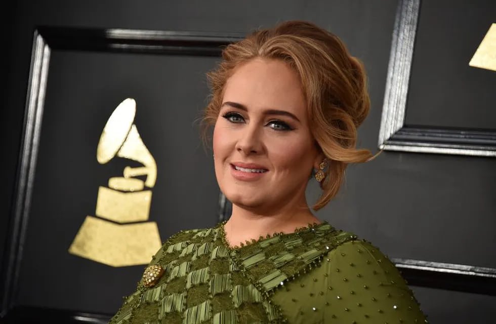 FILE - In this Feb. 12, 2017, file photo, Adele arrives at the 59th annual Grammy Awards at the Staples Center in Los Angeles. Adele confirmed her marriage to partner Simon Konecki in remarks to the audience at her concert in Brisbane, Australia, on Saturday, March 4, 2017. (Photo by Jordan Strauss/Invision/AP, File)