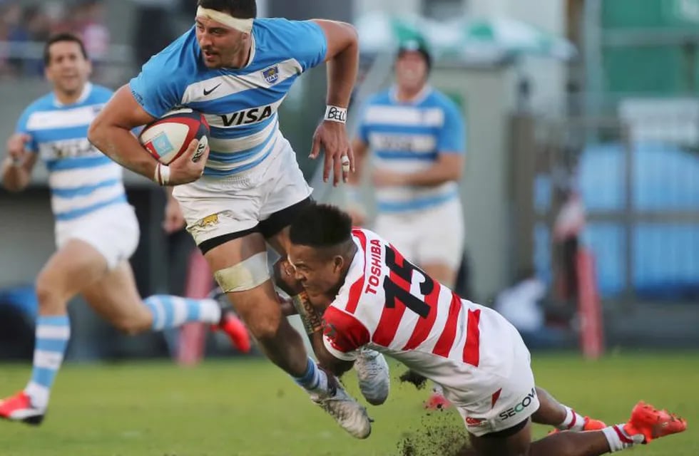 Javier Ortega Desio, left, of Argentina is tackled by Kotaro Matsushima of Japan during their rugby match in Tokyo, Saturday, Nov. 5, 2016. Argentina's Nicolas Sanchez scored two tries as the Pumas overpowered Japan 54-20 on Saturday in their first test under new coach Jamie Joseph. (AP Photo/Koji Sasahara)