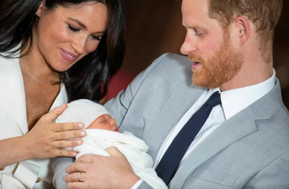 Britain's Prince Harry and Meghan, Duchess of Sussex, during a photocall with their newborn son, in St George's Hall at Windsor Castle, Windsor, south England, Wednesday May 8, 2019. Baby Sussex was born Monday at 5:26 a.m. (0426 GMT; 12:26 a.m. EDT) at an as-yet-undisclosed location. An overjoyed Harry said he and Meghan are \