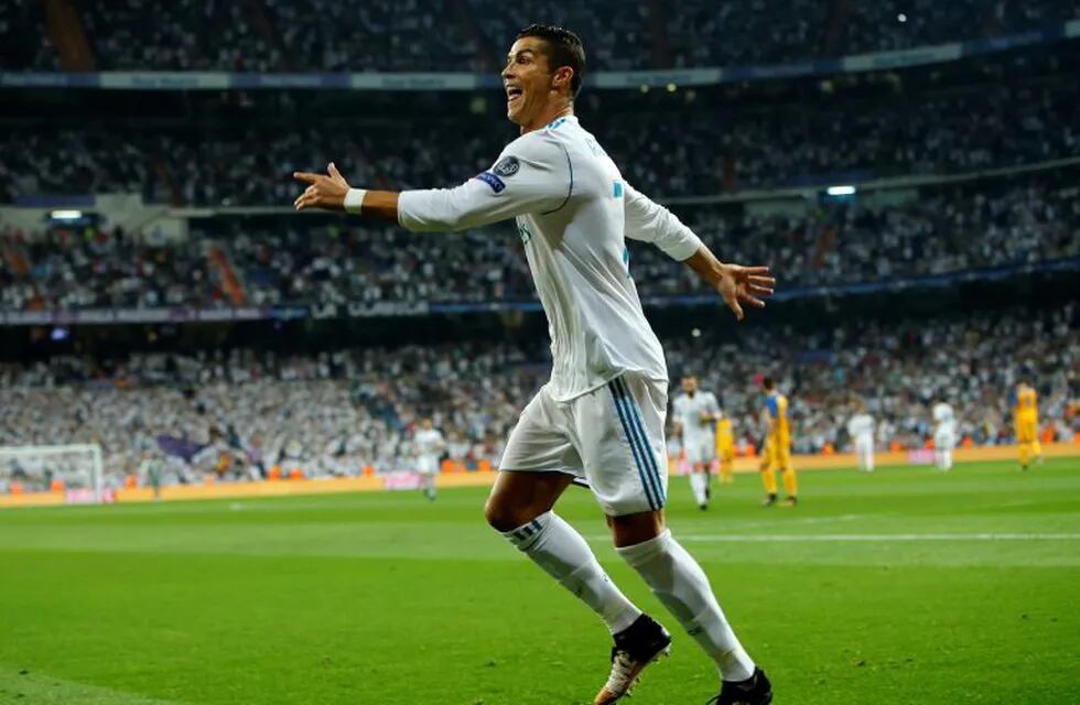 Real Madrid's Cristiano Ronaldo celebrates scoring during a Champions League group H soccer match between Real Madrid and Apoel Nicosia at the Santiago Bernabeu stadium in Madrid, Spain, Wednesday, Sept. 13, 2017. (AP Photo/Paul White)