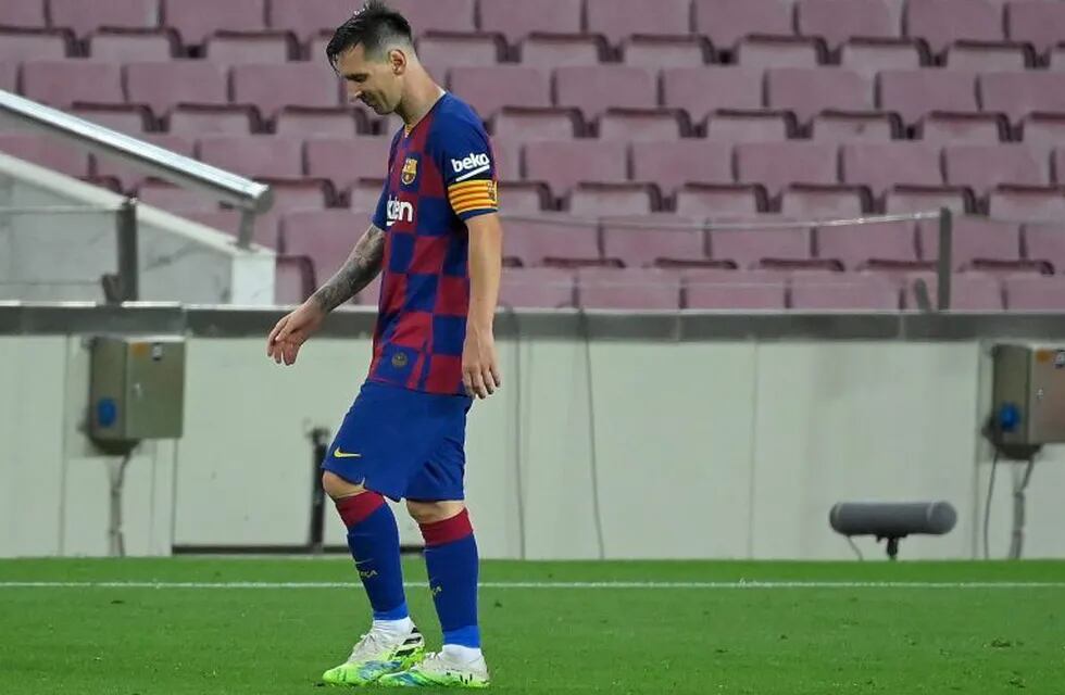 Barcelona's Argentine forward Lionel Messi walks off the pitch at the end of the Spanish League football match between FC Barcelona and Club Atletico de Madrid at the Camp Nou stadium in Barcelona on June 30, 2020. (Photo by LLUIS GENE / AFP)