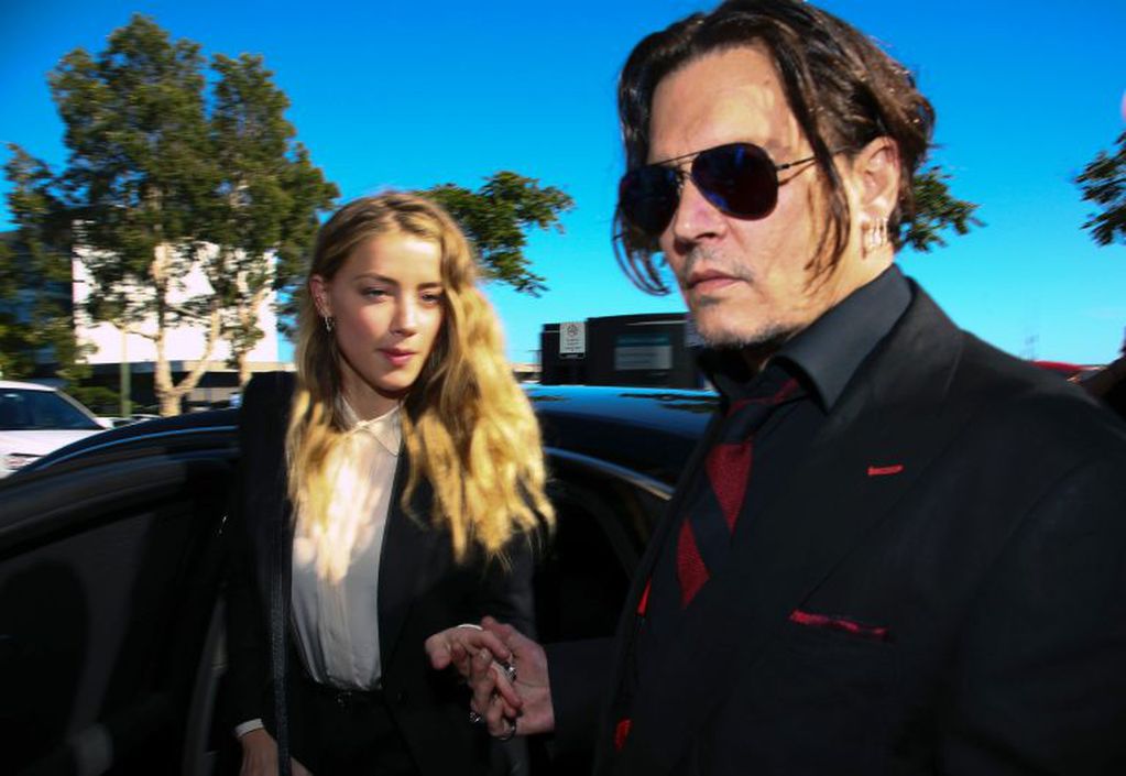 Johnny Depp  y Amber Heard/ AFP PHOTO / Patrick HAMILTON  Johnny Depp