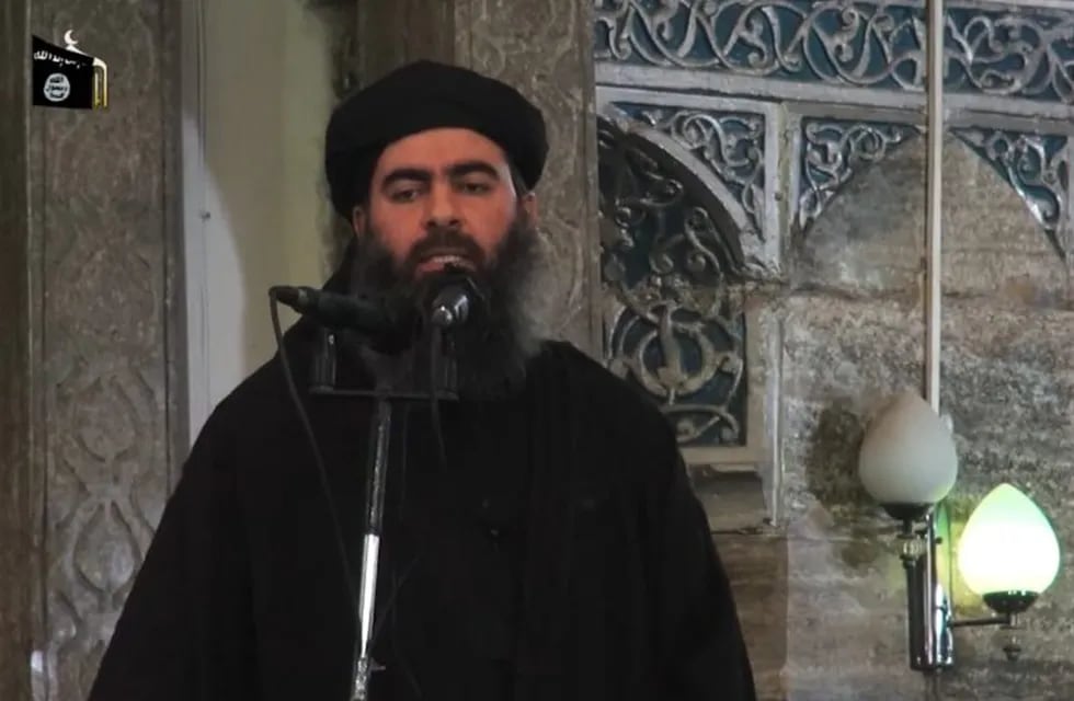 (FILES) - A file image grab taken from a propaganda video released on July 5, 2014 by al-Furqan Media allegedly shows the leader of the Islamic State (IS) jihadist group, Abu Bakr al-Baghdadi, aka Caliph Ibrahim, adressing Muslim worshippers at a mosque in the militant-held northern Iraqi city of Mosul. Baghdadi, on May 14, 2015, urged Muslims to emigrate to his self-proclaimed \