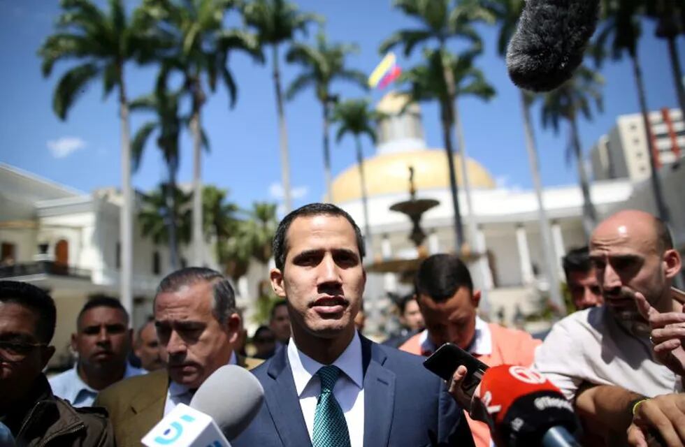 Venezuelan opposition leader Juan Guaido walks as he speaks to journalists before a news conference at the National Assembly in Caracas, Venezuela February 4, 2019. REUTERS/Andres Martinez Casares