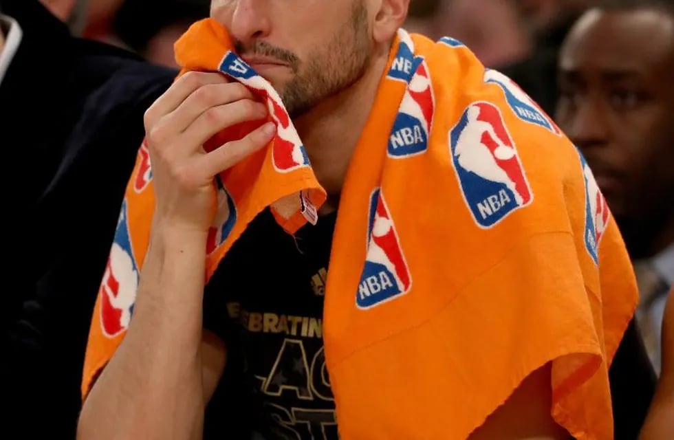 NEW YORK, NY - FEBRUARY 12: Manu Ginobili #20 of the San Antonio Spurs looks on from the bench in the second half against the New York Knicks at Madison Square Garden on February 12, 2017 in New York City. NOTE TO USER: User expressly acknowledges and agr