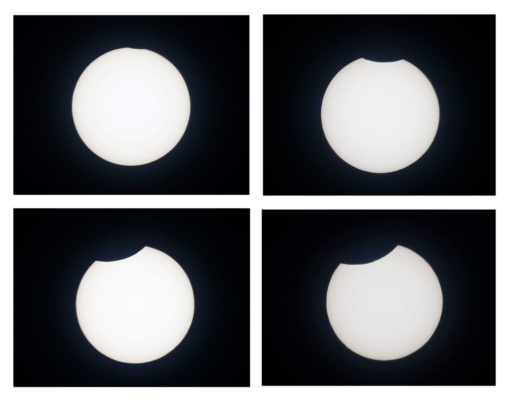 PAMPLONA, 10/06/2021.- Composición de varias imágenes de diferentes fases del eclipse solar que ha podido observarse este jueves de manera parcial en España