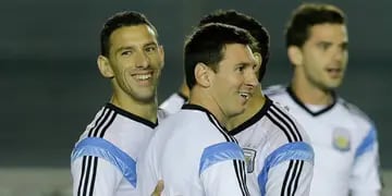 Maxi Rodríguez y Lionel Messi