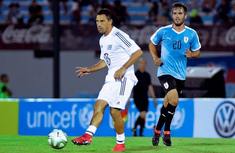 El capitán de Newell's marcó el descuento con asistencia de Andrés D'Alessandro. (AFP)