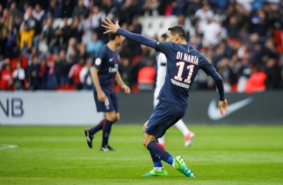 PSG's Angel Di Maria celebrates after scoring during the French League One soccer match between PSG and Montpellier at the Parc des Princes stadium in Paris, France, Saturday, April 22, 2017. (AP Photo/Kamil Zihnioglu)