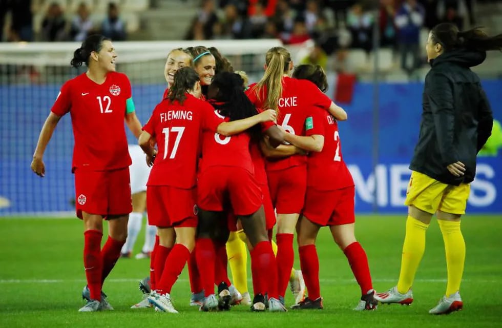 Soccer Football - Women's World Cup - Group E - Canada v New Zealand - Stade des Alpes, Grenoble, France - June 15, 2019  Canada players celebrate at the end of the match    REUTERS/Denis Balibouse