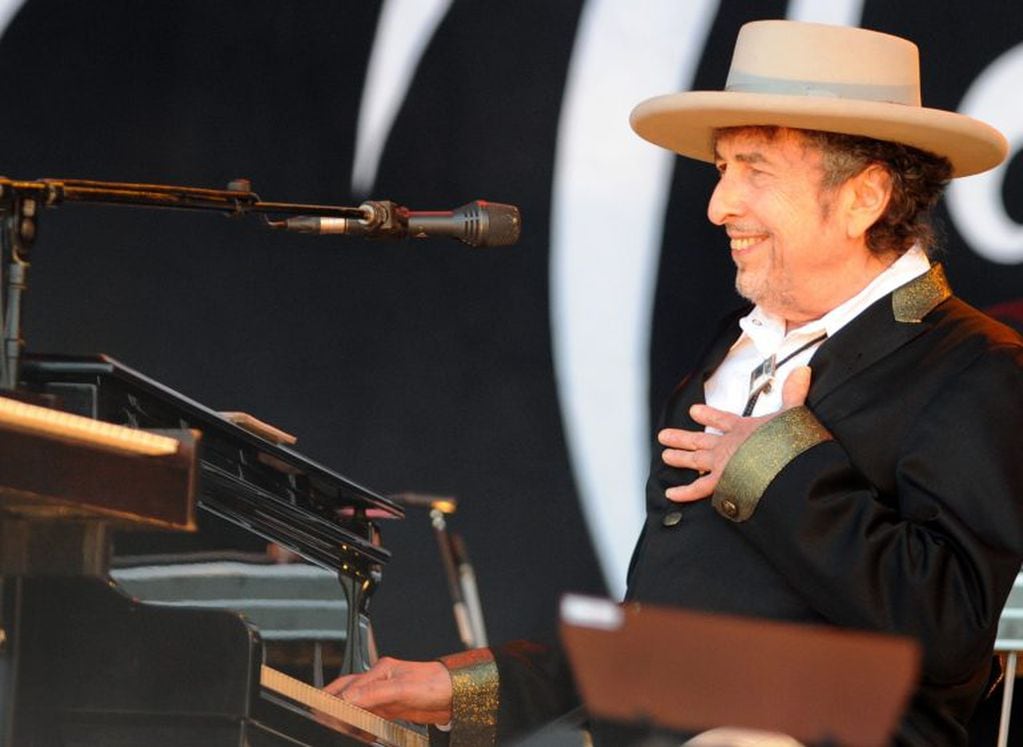 (FILES) This file photo taken on July 22, 2012 shows US poet and folk singer Bob Dylan performing during the 21st edition of the Vieilles Charrues music festivalin Carhaix-Plouguer, western France.
US songwriter Bob Dylan won the Nobel Literature Prize on