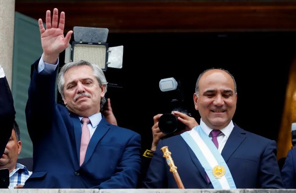 Argentina's President-elect Alberto Fernandez waves next to Governor of Tucuman Juan Manzur, in San Miguel de Tucuman, Argentina October 29, 2019. REUTERS/Agustin Marcarian