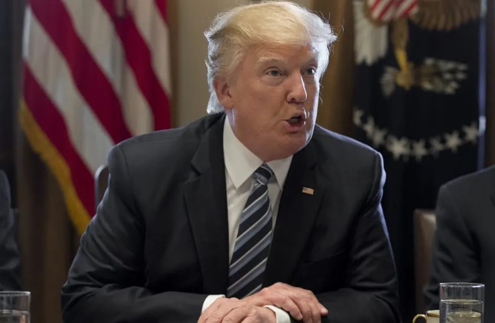 U.S. President Donald trump speaks during a meeting with members of the Cabinet at the White House in Washington, D.C., U.S, on Monday, March 13, 2017. Trump said it could take several years for health insurance prices to start to drop under an Obamacare 
