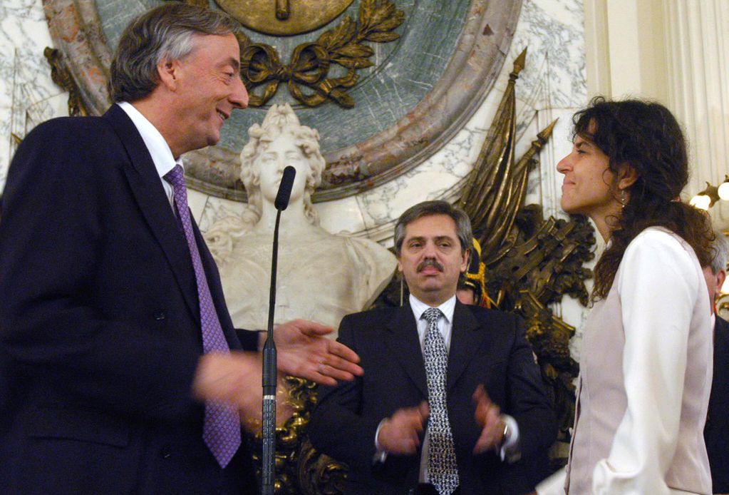 Romina Picolotti, Néstor Kirchner y Alberto Fernández. 