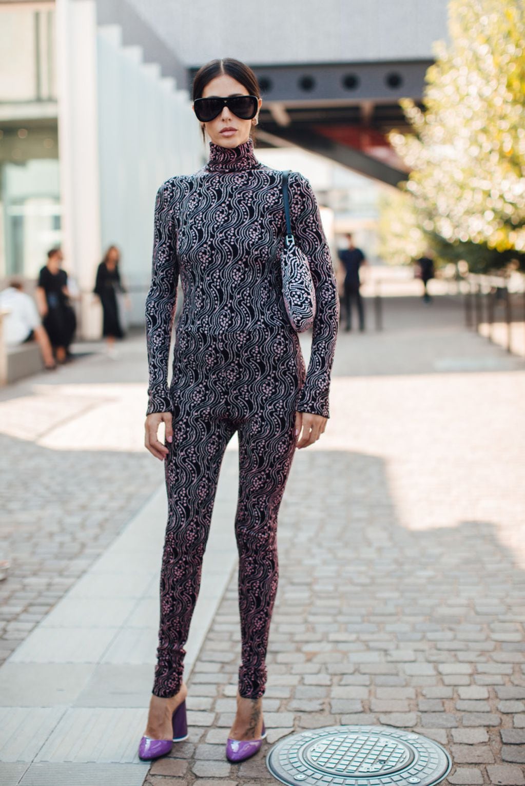 A showgoer in a Prada catsuit during Milan Fashion Week.
Photo: Imaxtree