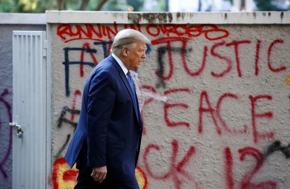 President Donald Trump walks from the White House through Lafayette Park to visit St. John's Church Monday, June 1, 2020, in Washington. (AP Photo/Patrick Semansky)