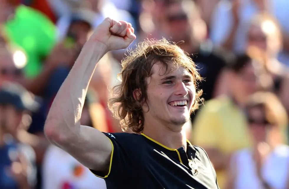 Alexander Zverev, of Germany, celebrates his win over Roger Federer, of Switzerland, in the final of the Rogers Cup tennis tournament, Sunday, Aug. 13, 2017, in Montreal. (Paul Chiasson/The Canadian Press via AP)