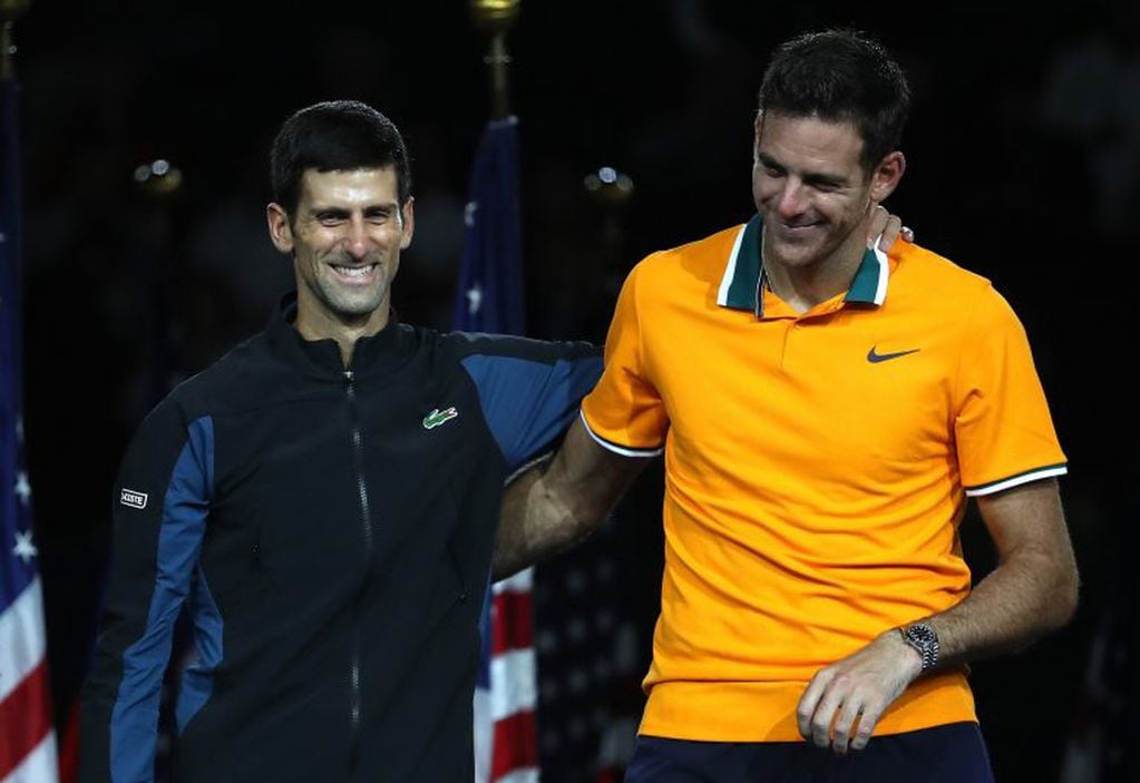 Juan Martín del Potro y Novak Djokovic. (AFP)