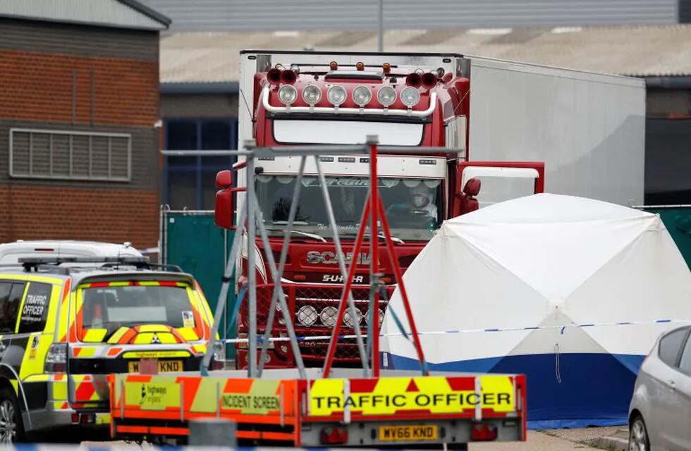Police is seen at the scene where bodies were discovered in a lorry container, in Grays, Essex, Britain October 23, 2019.  REUTERS/Peter Nicholls