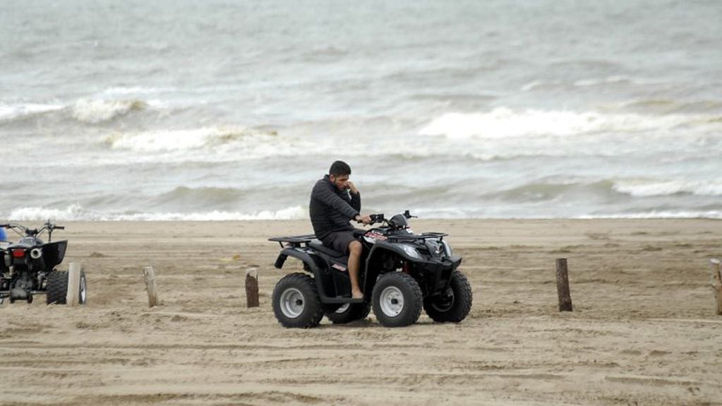 Cuatriciclo en la playa.