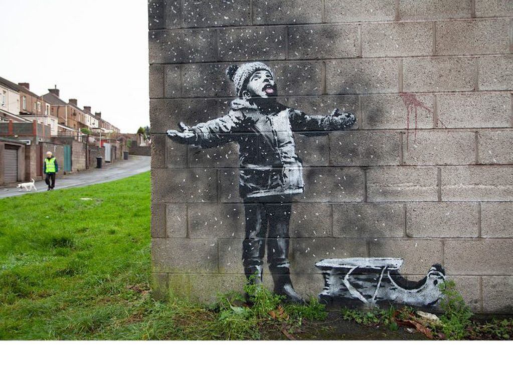 El artista callejero Bansky publicó las fotos del mural de Gales en su sitio web