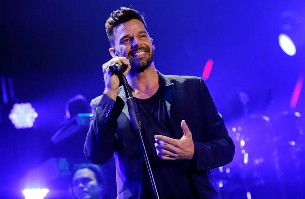 FILE - In this Nov. 22, 2014 file photo, Ricky Martin performs at the iHeart Radio Fiesta Latina concert in Inglewood, Calif.  Martin responded to the Supreme Court's ruling on Friday, June 26, that same-sex couples have a right to marry anywhere in the United States, by tweeting, u201cAhora en los EEUU no se llamara 