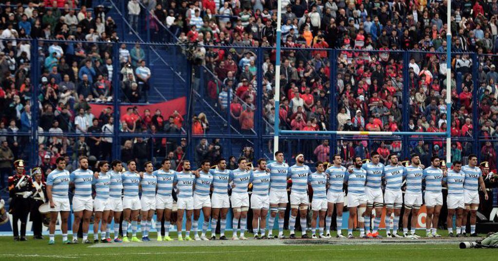 Argentina's Los Pumas players sing the national anthem before their Rugby Championship match against New Zealand's All Blacks at Jose Amalfitani stadium in Buenos Aires, Argentina on July 20, 2019. (Photo by ALEJANDRO PAGNI / AFP)