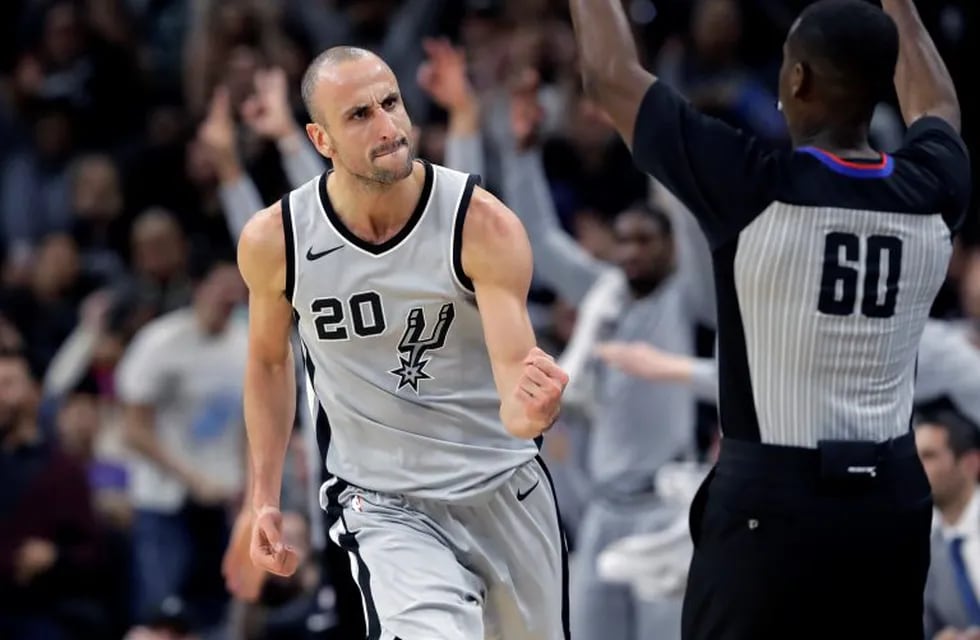 San Antonio Spurs guard Manu Ginobili (20) clenches his fist after scoring against the Phoenix Suns during the second half of an NBA basketball game Friday, Jan. 5, 2018, in San Antonio. San Antonio won 103-89. (AP Photo/Eric Gay)