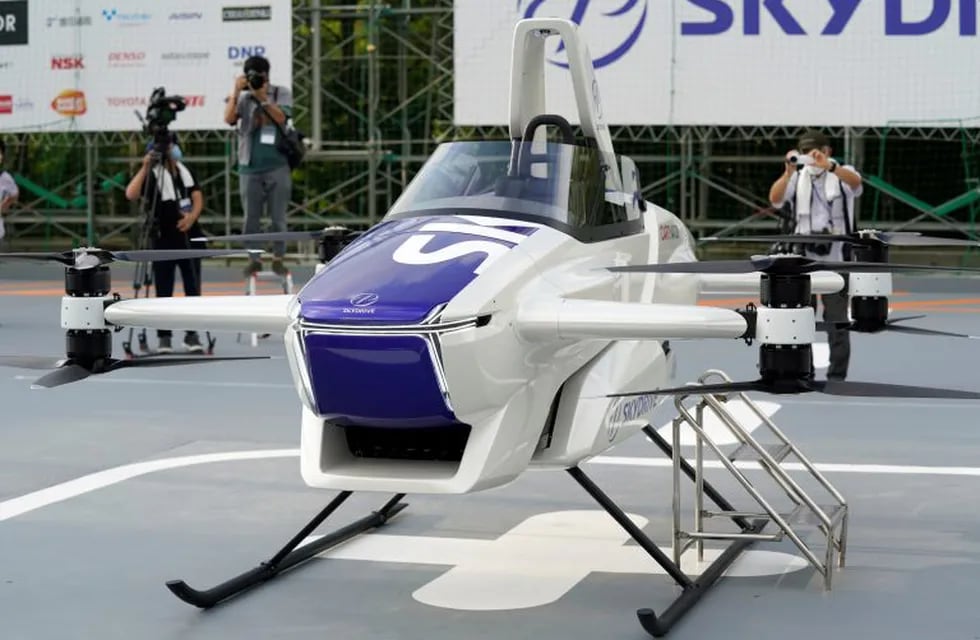 The SkyDrive Inc. SD-03 flying car sits on display during a demonstration to the media at the Toyota Test Field in Toyota City, Aichi Prefecture, Japan, on Tuesday, Aug. 25, 2020. Japan's government wants the country to become a leader in the flying-car technology, producing a national road map for its development and studying ways to define and advance regulations. Photographer: Toru Hanai/Bloomberg