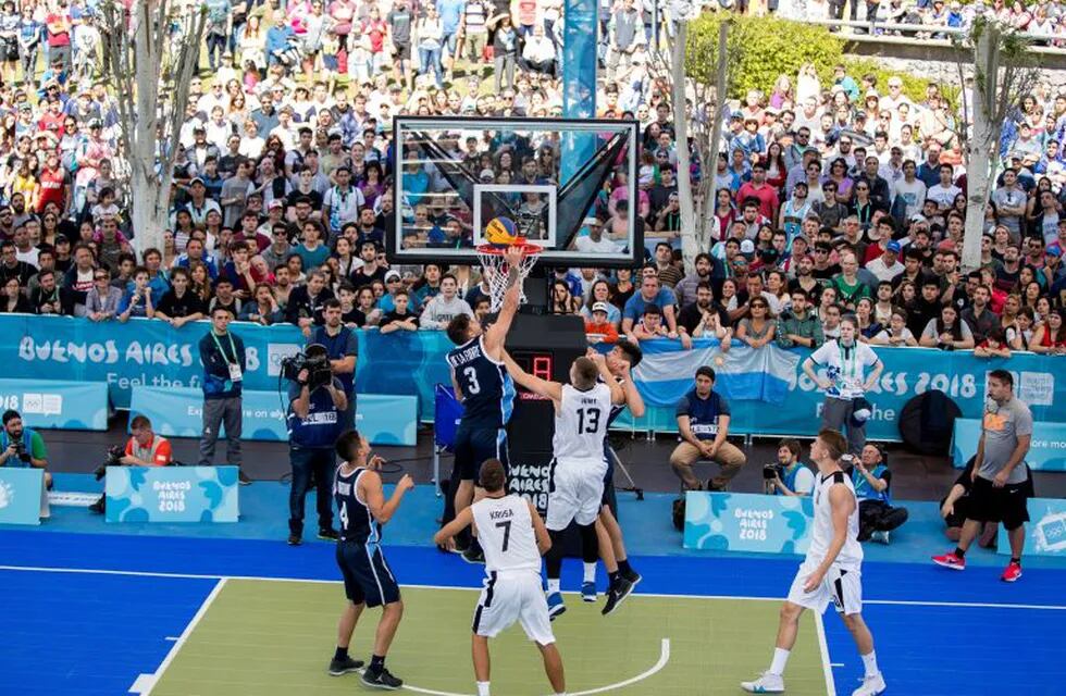 Argentina's Juan Esteban De La Fuente puts the ball into the basket during the Basketball 3x3 Men's Preliminary Round match between Argentina and Estonia at the Parque Mujeres Argentinas, Urban Park during The Youth Olympic Games, Buenos Aires, Argentina October 7, 2018.   Simon Bruty  for OIS/IOC/Handout via REUTERS ATTENTION EDITORS - THIS IMAGE HAS BEEN SUPPLIED BY A THIRD PARTY.