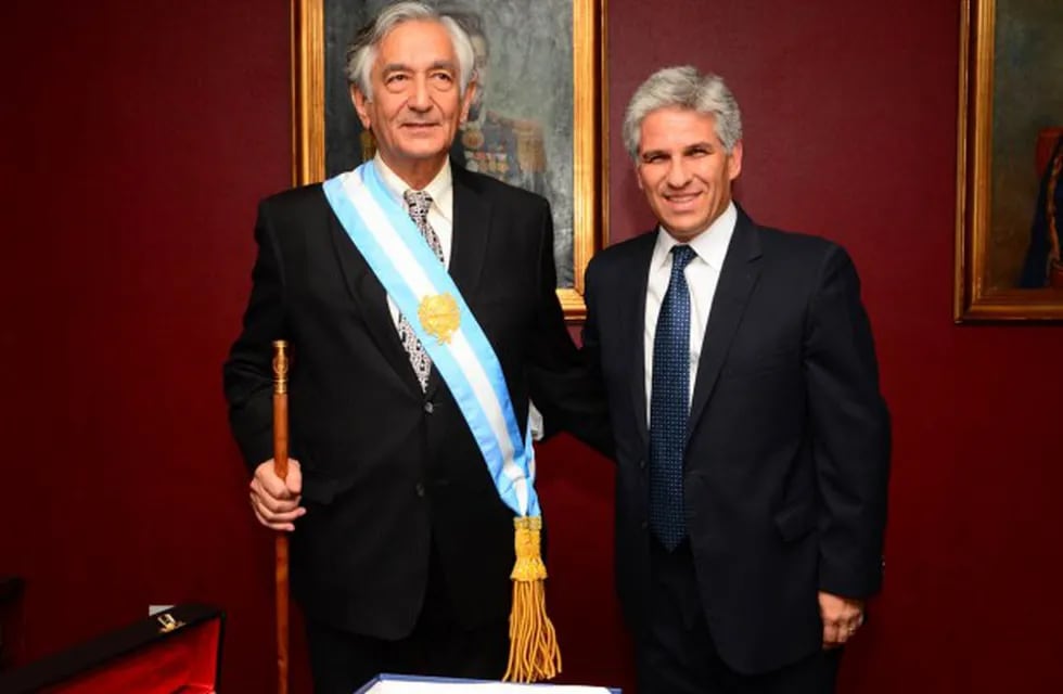 Alberto Rodríguez Saá junto a Claudio Poggi, hoy oposición.
