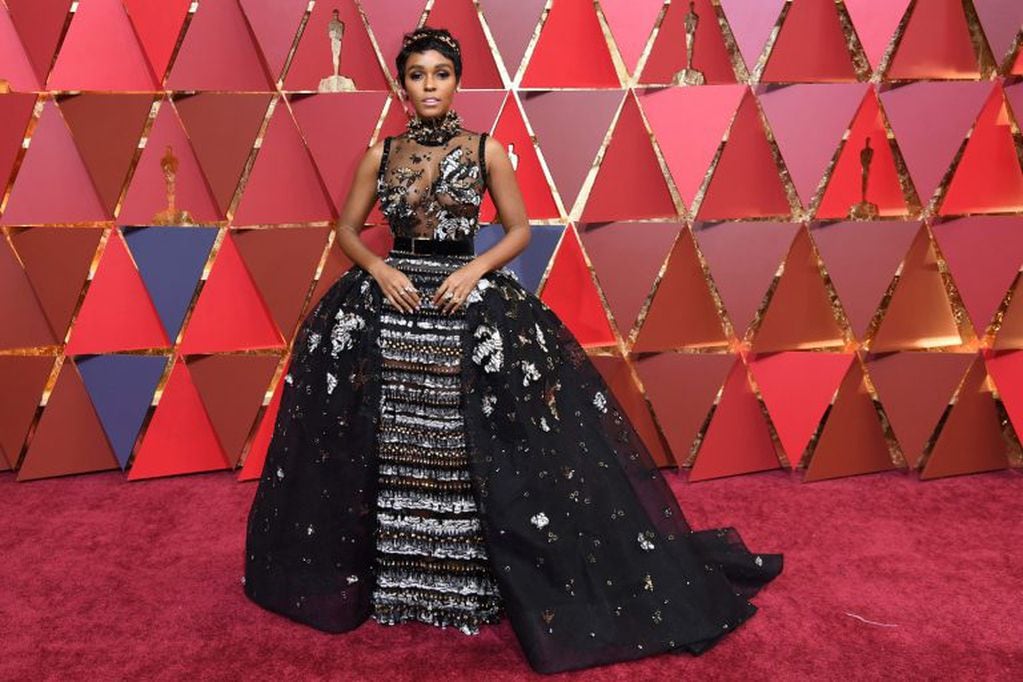 US actress and singer Janelle Monae poses as she arrives on the red carpet for the 89th Oscars on February 26, 2017 in Hollywood, California.  / AFP PHOTO / ANGELA WEISS