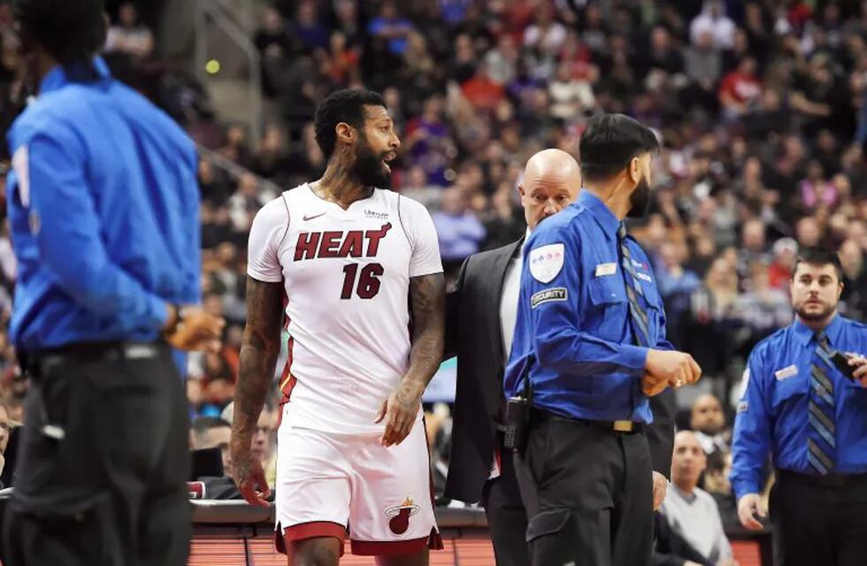 Miami Heat forward James Johnson (16) is ejected from the game along with Toronto Raptors forward Serge Ibaka, not seen, during the second half of an NBA basketball game Tuesday, Jan. 9, 2018, in Toronto. (Nathan Denette/The Canadian Press via AP)