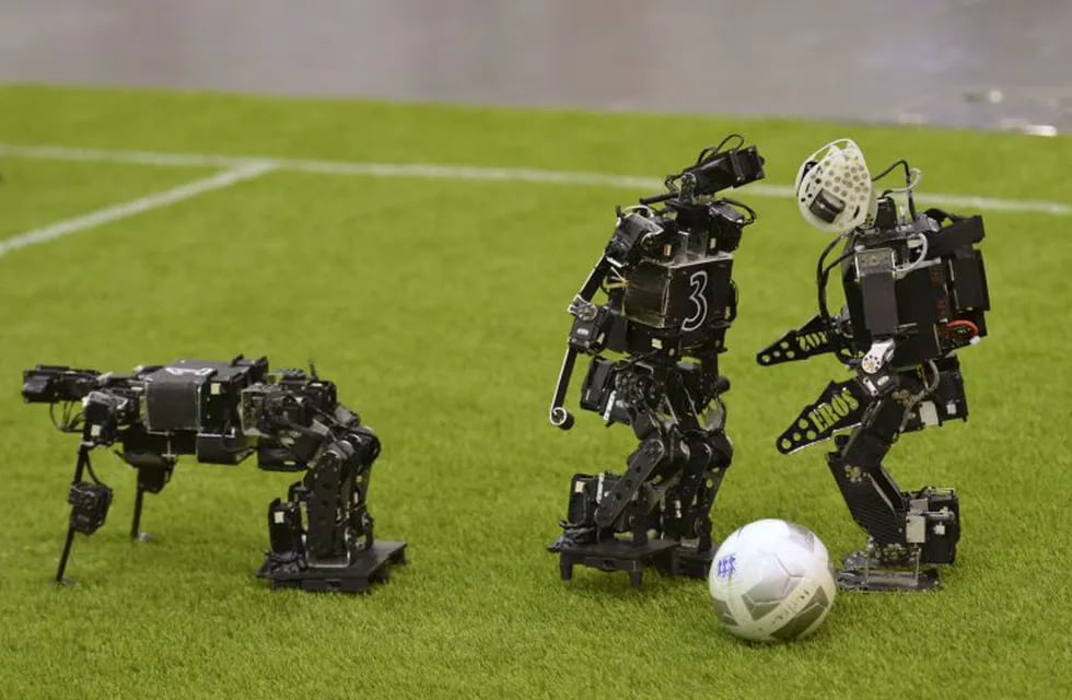 Humanoid robots compete during the 2015 Robocup in Hefei, Anhui province, July 22, 2015. The Robocup, or \