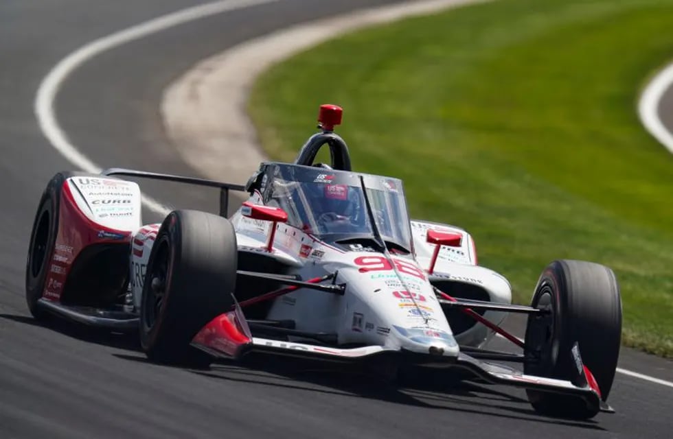 Marco Andretti drives through the third turn during qualifying for the Indianapolis 500 auto race at Indianapolis Motor Speedway in Indianapolis, Saturday, Aug. 15, 2020. (AP Photo/Michael Conroy)