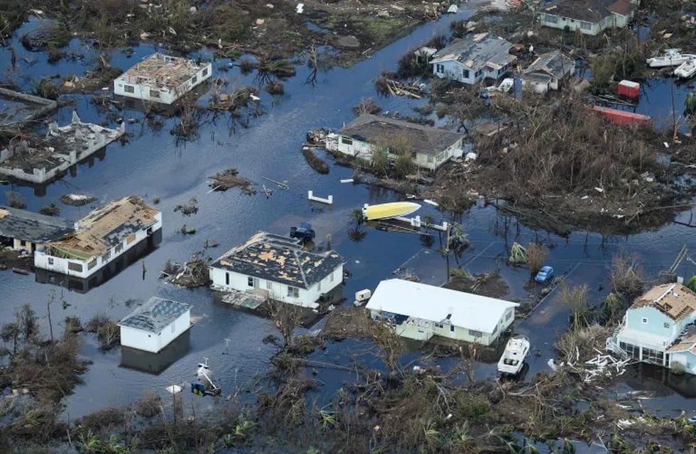 TOPSHOT - An aerial view of damage from Hurricane Dorian on September 5, 2019, in Marsh Harbour, Great Abaco Island in the Bahamas. - Hurricane Dorian lashed the Carolinas with driving rain and fierce winds as it neared the US east coast Thursday after devastating the Bahamas and killing at least 20 people. (Photo by Brendan Smialowski / AFP)