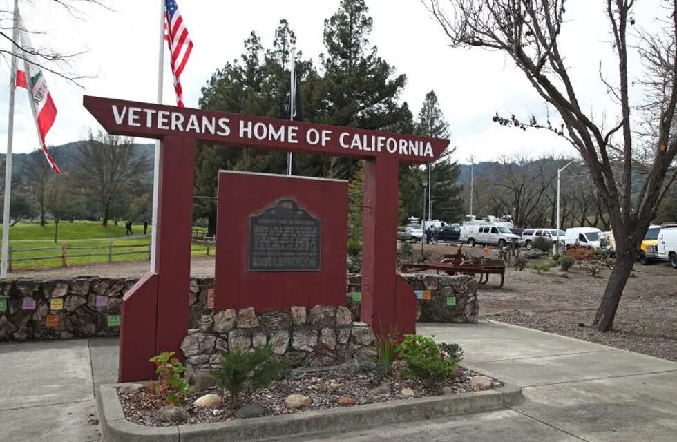 Media trucks stage at the entrance to the Veterans Home of California in Yountville, Calif., on Friday, March 9, 2018. A gunman took at least three people hostage at the largest veterans home in the United States on Friday, leading to a lockdown of the sprawling grounds in California, authorities said. (AP Photo/Ben Margot)