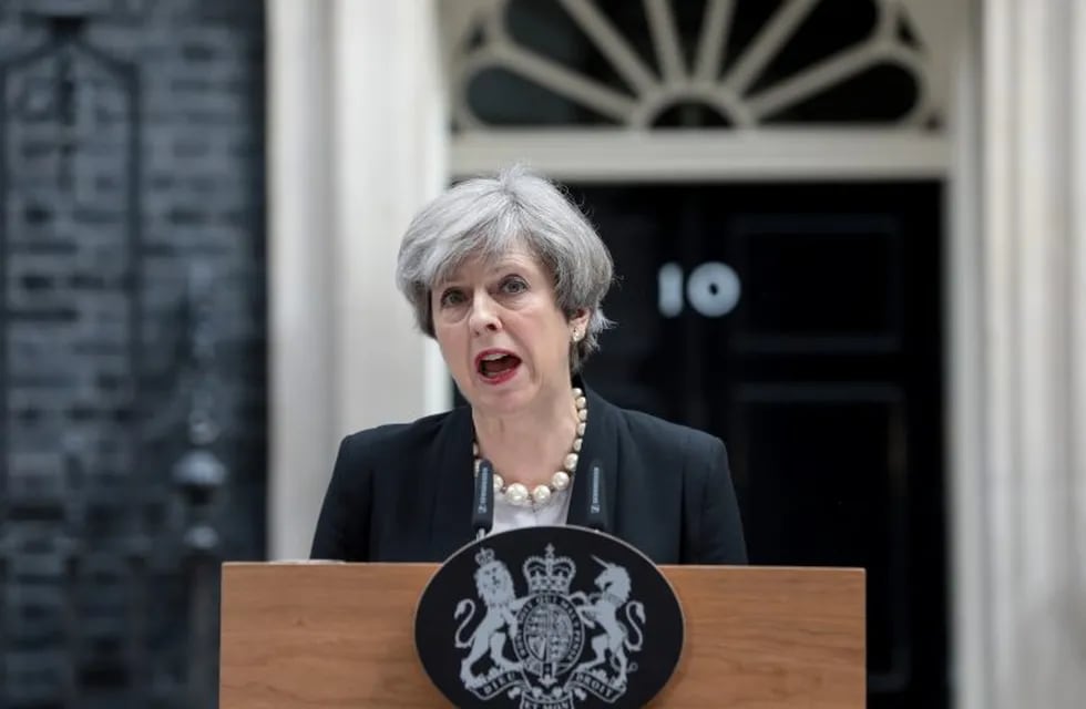 Theresa May, U.K. prime minister, delivers a statement outside number 10 Downing Street in London, U.K., on Tuesday, May 23, 2017.u00a0At least 22 people were killed in a suicide bombing at a pop concert packed with children in the northern English city of Manchester, in the worst terror incident on British soil since the London bombings of 2005. Photographer: Simon Dawson/Bloomberg